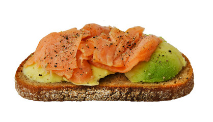 Sandwich with avocado and red fish on a white background. Close-up