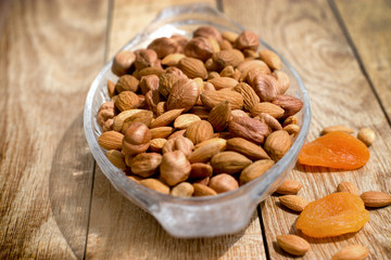 Hazelnut and almond in bowl, healthy vegetarian food