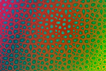 Abstract background. Scales, bubbles, leather, gradient. Red, Green