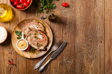 Roasted whole, stuffed with minced pork neck.