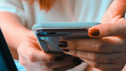Close up image of Woman Using a Smart Phone