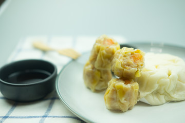 Steamed shrimp dumpling and pork buns