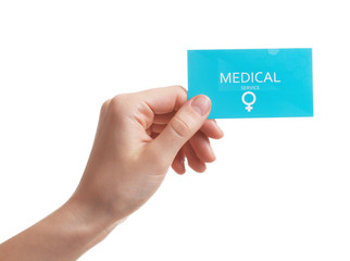 Girl holding medical business card isolated on white, closeup. Women's health service