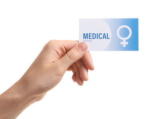 Girl holding medical business card isolated on white, closeup. Women's health service