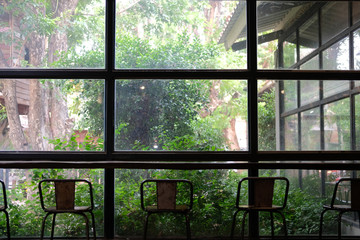 stool in cafe coffee shop near garden window