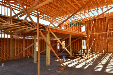 Wood framework of commercial building under construction.