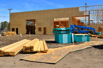 Wood framework of commercial building under construction.