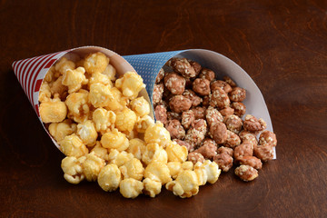 caramel popcorn and honey sesame seed almonds in paper cones