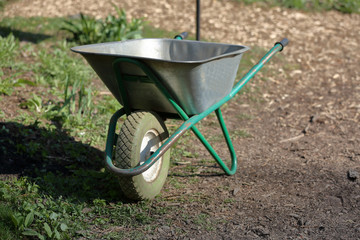Iron trolley for manual moving of building materials in the garden and in the backyard