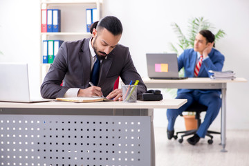 Two male colleagues in the office 