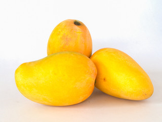 Ripe mango on a white background