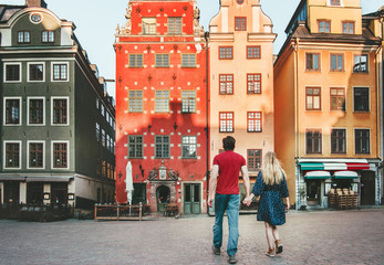 Couple in love traveling together in Stockholm romantic sightseeing walk  vacations lifestyle...