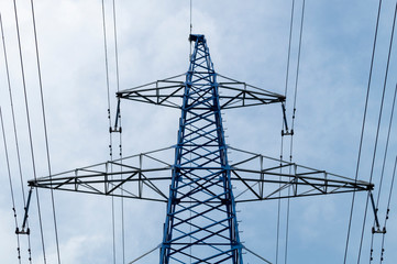 high-voltage power lines against the sky