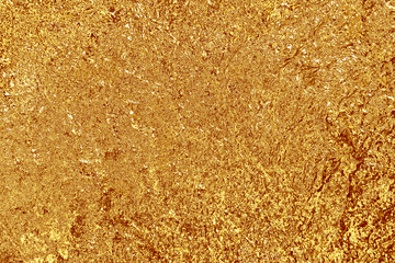 shiny golden yellow plaster on wall texture background