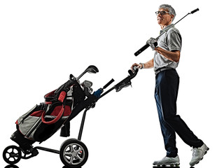 one caucasian senior man golfer golfing  in studio shadow silhouette isolated on white background