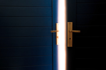 open blue door with sun light