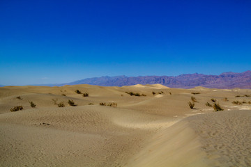 Fototapeta na wymiar Sand Dunes, Mysterious and Amazing Landscape in Death Valley, California