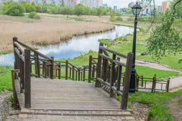 spring landscape river forest trees against a blue sky