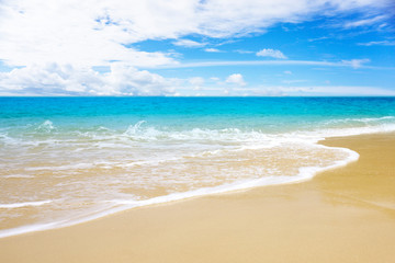 Fototapeta na wymiar blue sky and beautiful beach. Vacation holidays background wallpaper. View of nice tropical beach.