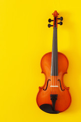 Fototapeta na wymiar Violin poster yellow and orange good for classical music concert, ads, violinist visit card