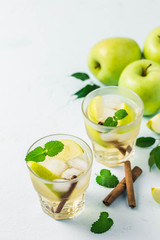 Refreshing iced apple cinnamon mocktail. Selective focus, space for text.