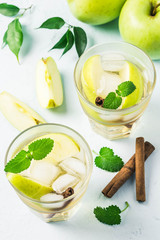 Refreshing iced apple cinnamon mocktail. Selective focus, space for text.