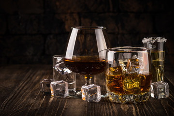 Strong alcohol drinks - whiskey, cognac, vodka, rum, tequila. 