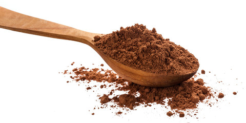 Pile of cocoa powder isolated on white background, cinnamon powder in wooden spoon