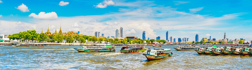 Panorama view  Temple of the Emerald of buddha or Wat Phra Kaew  and Arun temple or  wat arun  in Chao Phraya river at Bangkok Thailand - obrazy, fototapety, plakaty