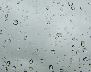 Rain drops on home glass window