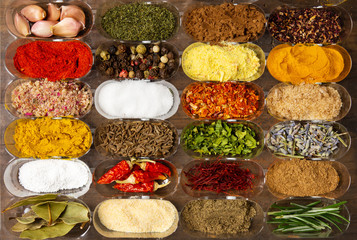 Collection of spices in small bowls