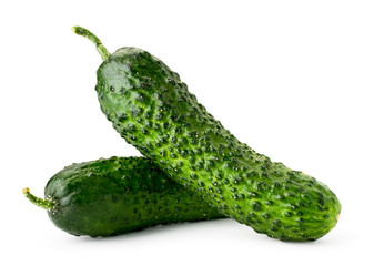 Two ripe cucumbers on a white background, isolated.