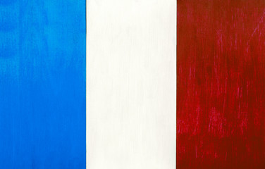 French flag as a painted wooden background, for rustic, vintage and authentic styles - pastel paint on wood for the country of France.