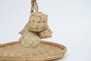 Popular Malay traditional Ramadan food, Ketupat or Ketupat Palas. Favorite food for breaking fast,...