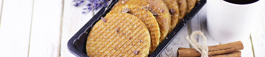 Horizontal panorama bakground of viennese wafers with caramel