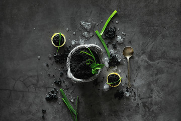 Fresh black fish roe. Beluga caviar served with ice.