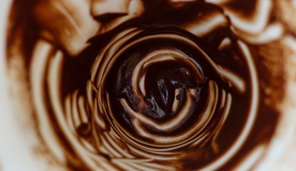 Abstract background. Remains of hot chocolate on the white walls of the cup.