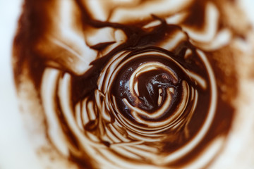Abstract background. Remains of hot chocolate on the white walls of the cup.