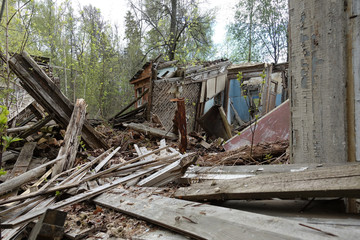 Fototapeta na wymiar abandoned ruin house, wooden architecture, debris, housing wreck