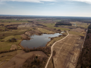 aerial view of rural area with forests and lakes