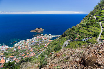 Top view of the city of Porto Moniz in the north-west of the island of Madeira on a sunny summer day.