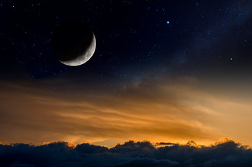Fototapeta na wymiar Sunset with moon and stars