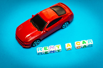 Photo toy cars. The inscription to rent a car.