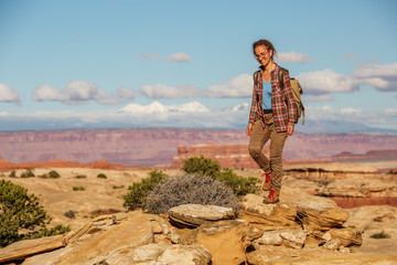 Hiker in Canyonlands National park, needles in the sky, in Utah, USA
