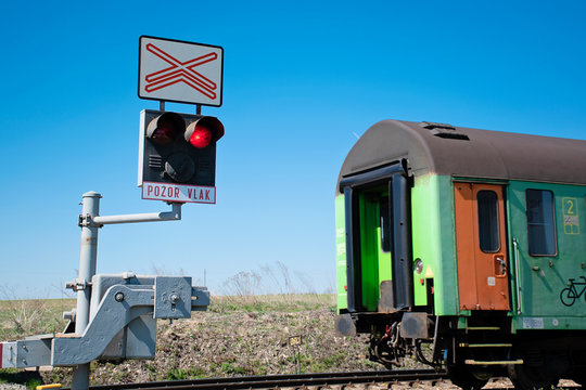 Train crossed controlled railroad crossing.  Railroad crossing sign lights.