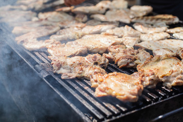 Grilled chicken meat on barbecue outdoor