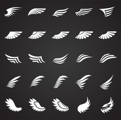 Wings icons set on black background for graphic and web design. Simple vector sign. Internet concept symbol for website button or mobile app.