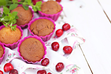 Home made chocolate muffins with cherry
