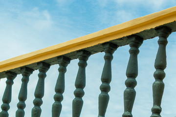 Terrace columns with a cloudy blue sky background