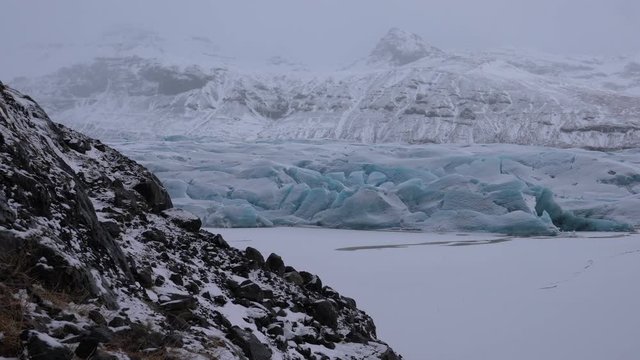 Panoramic image of the snow-coverd glacier Svinafellsjoekull on a winter day after snowfall, Iceland, Europe